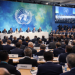 World leaders attending international climate negotiations focused on emissions reduction and climate finance