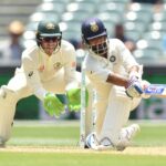 India and Australia players competing in high-intensity Test cricket match
