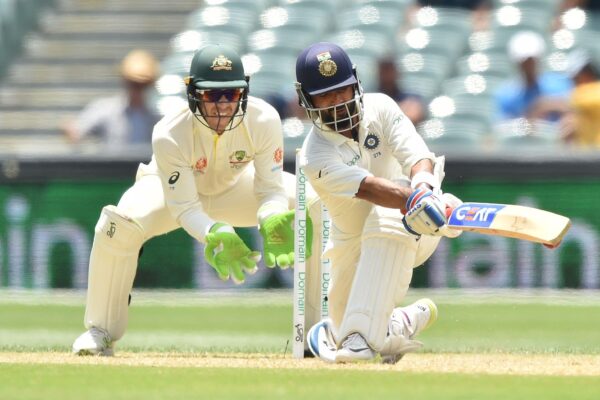 India and Australia players competing in high-intensity Test cricket match