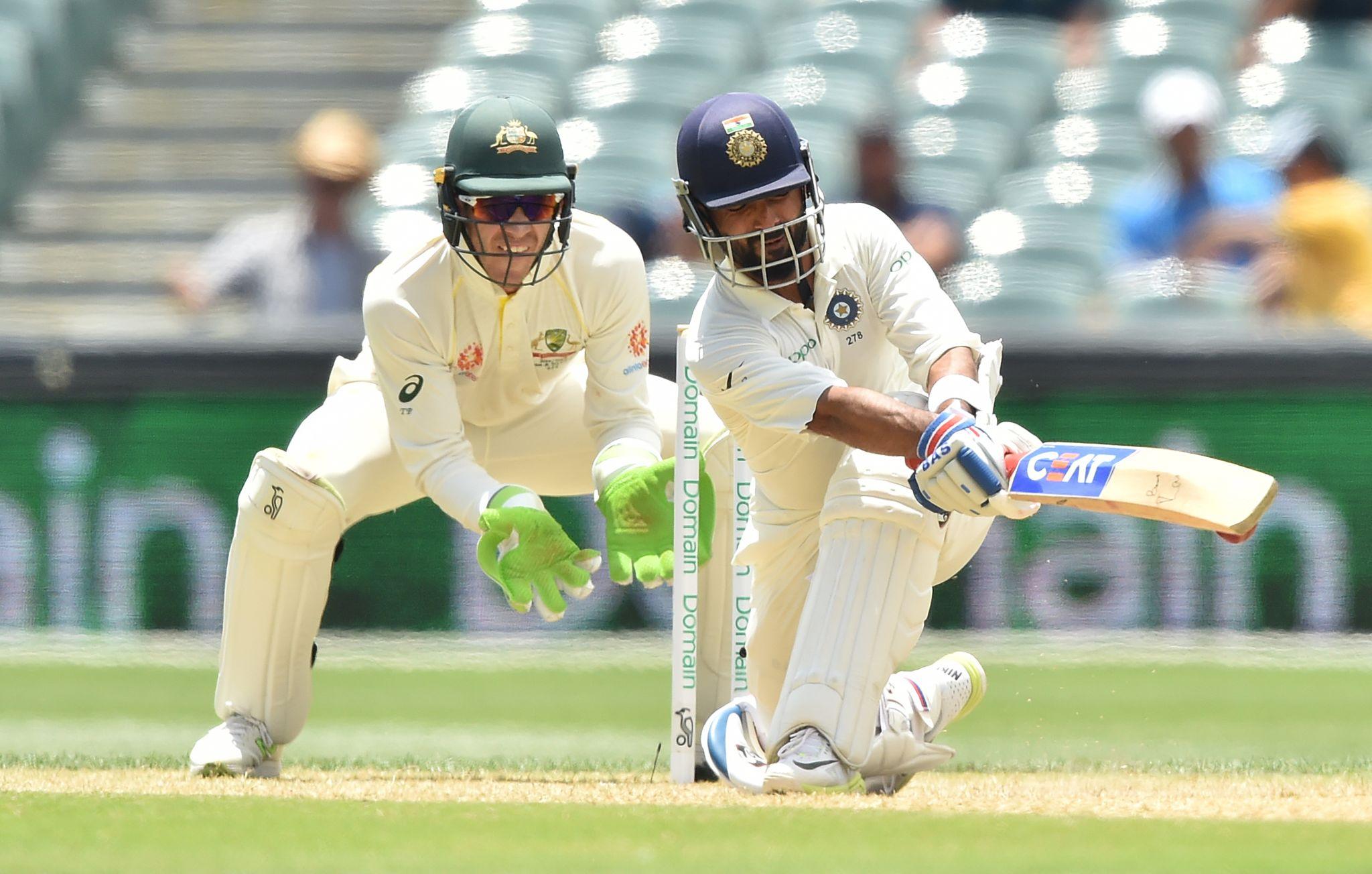 India and Australia players competing in high-intensity Test cricket match