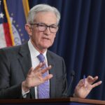 Federal Reserve building with inflation chart and financial market elements symbolizing US interest rate policy decisions.