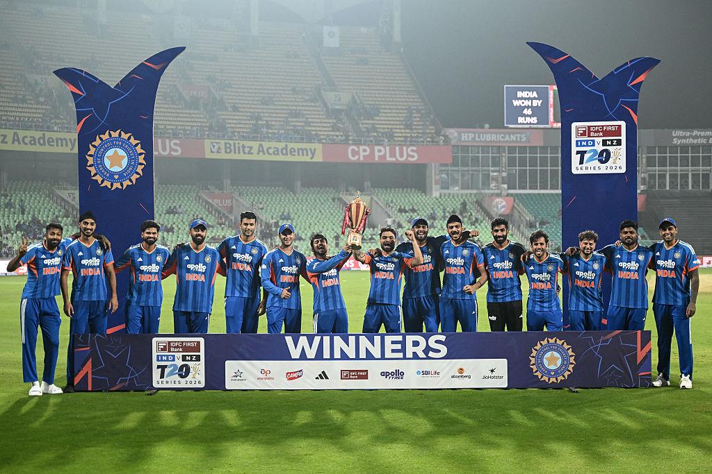 India cricket team celebrating T20 World Cup victory with trophy in stadium