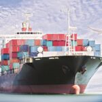 Cargo ships traveling through the Red Sea as naval forces patrol the strategic shipping route.