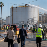 Southern California chemical tank leak evacuation with emergency crews, hazmat response and residents leaving affected area