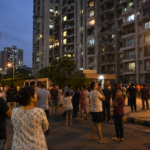 Delhi-NCR residents standing outside buildings after earthquake tremors from Afghanistan.