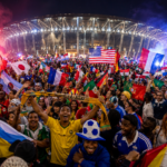 FIFA World Cup 2026 global fan celebration with flags, stadium lights and football festival atmosphere
