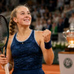 Young female tennis champion celebrating French Open victory on clay court