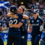 Scotland women’s cricket team celebrating their first-ever T20 World Cup win against Ireland.